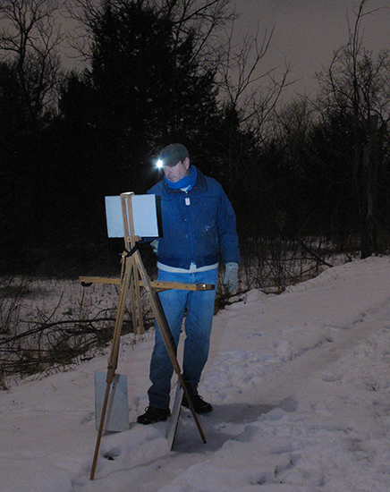Photo of John Hulsey painting plein air at night, by Ann Trusty