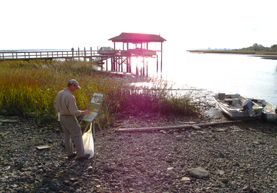 Photo of Kevin Menck painting near Charleston, S.C., by John Hulsey