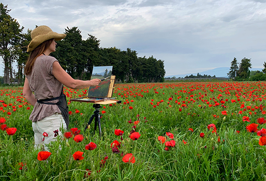Photo of Artist Jane Hunt Painting en Plein Air in Provence