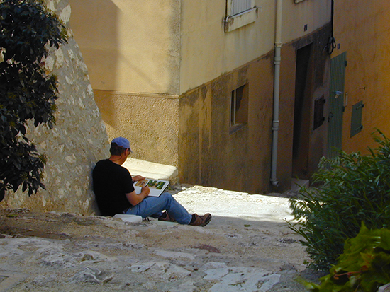 photo of John Hulsey painting in France.