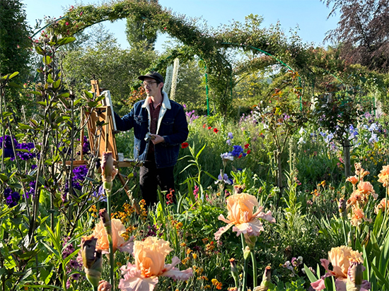 Photograph of Artist Eric Santoli Painting in Monet's Gardens by M. Jean Gaumy