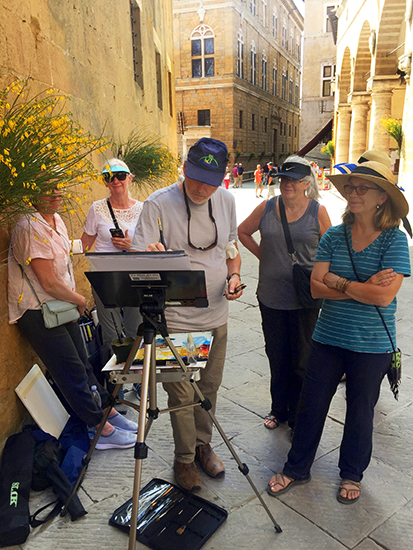 Photograph of John Hulsey Demonstrating Watercolor in Pienza © A. Trusty